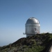 An image of the shiny silver dome of the Nordic Optical Telescope (NOT) during the daytime.