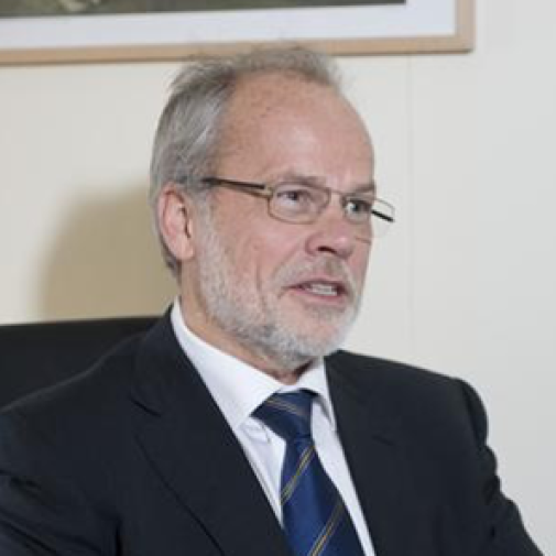 An image of Torsten Åkesson in a suit with a blue tie.