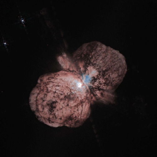A bright star that is losing its outer layers in two opposite directions as it ages.