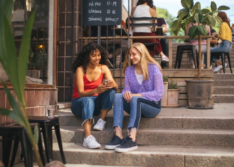 Two female students at a café in central Stockholm.
