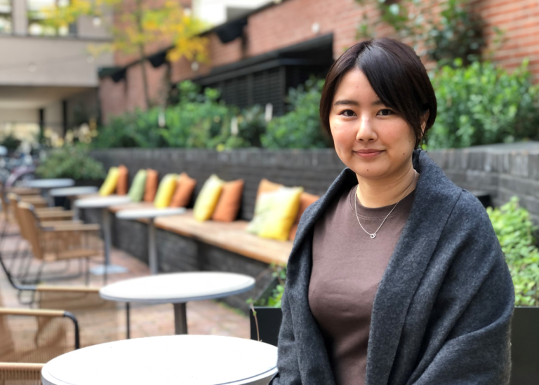 Ai Kuno sitting at a café
