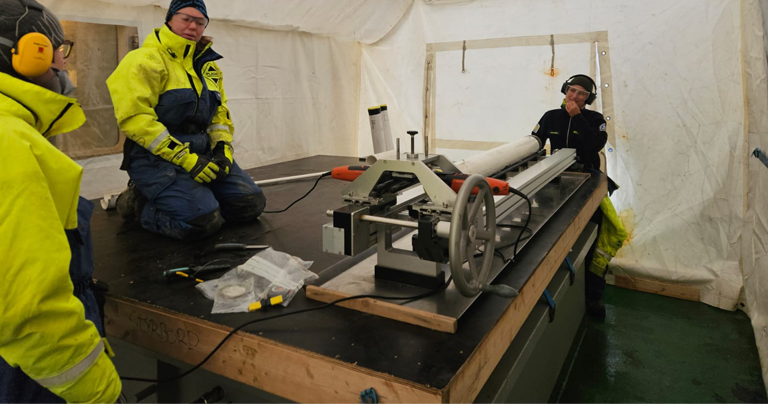 Researchers split a sediment core for sampling and analysis.