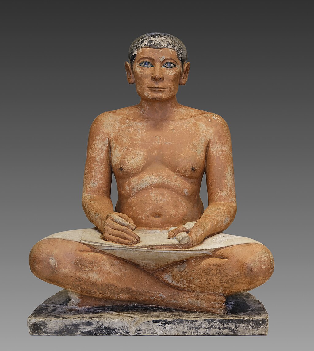 Le Scribe accroupi - Musée du Louvre Antiquités égyptiennes E 3023 . Possibly Auguste Mariette, CC0, via Wikimedia Commons