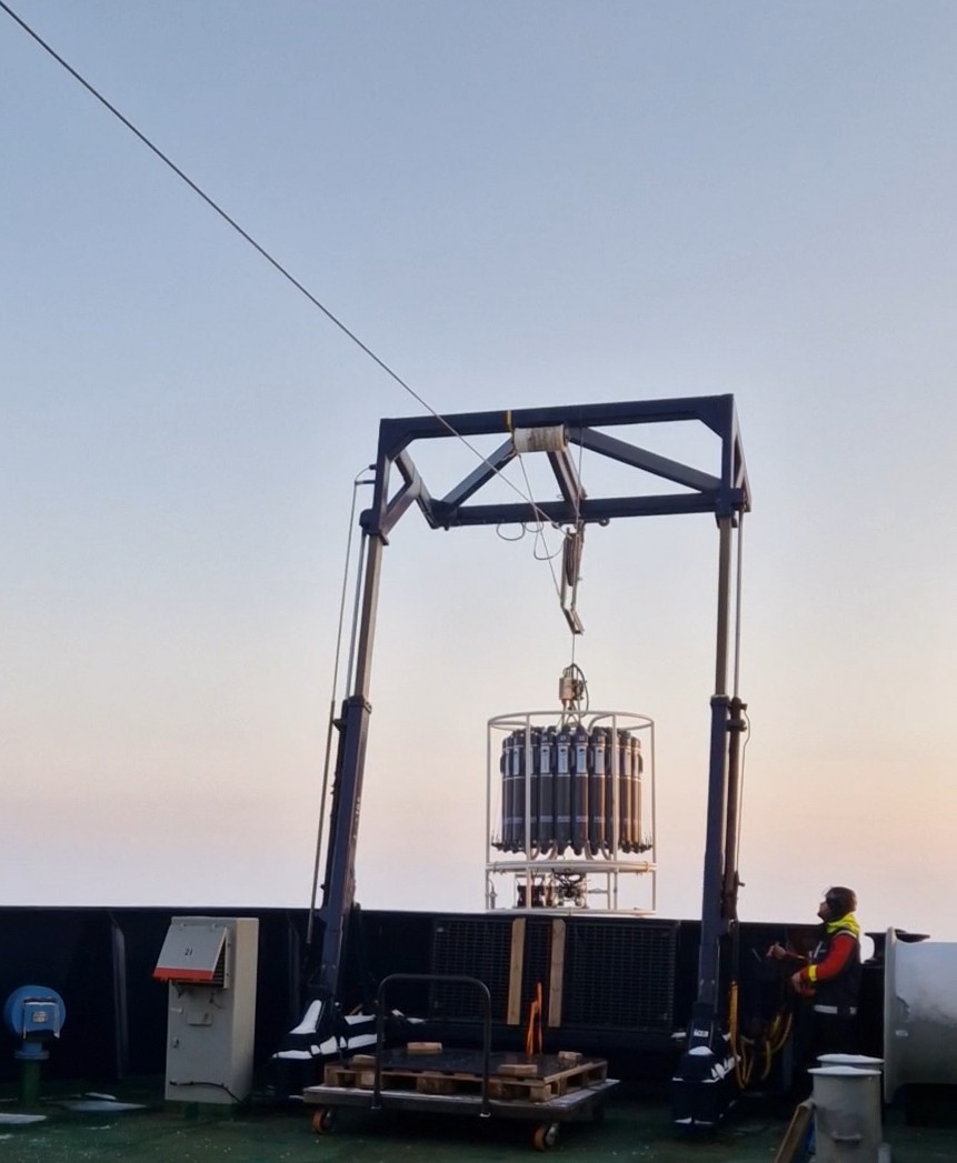 Caption: The CTD being lowered to the ocean floor, more than 4000 meters below the surface.