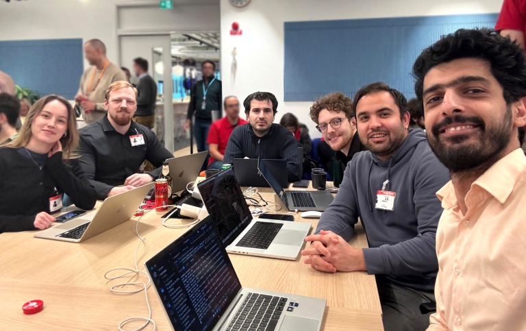 Group photo of the DSVx team at a hackathon on March 26, 2025.
