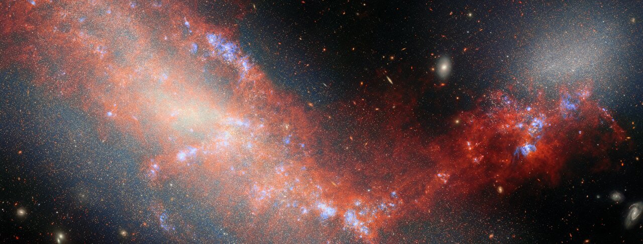 This JWST color composite image displays the two interacting dwarf galaxies.