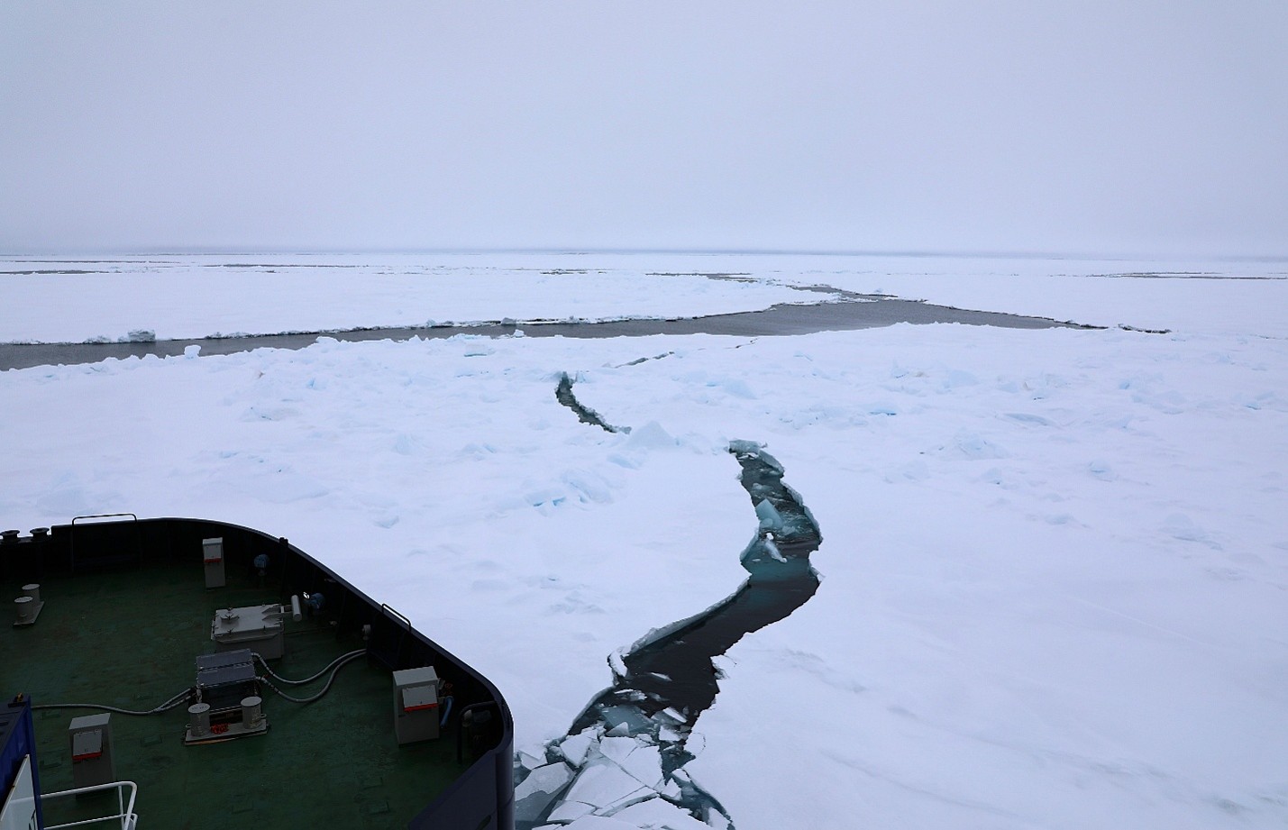 Caption: Oden pushes through an area of heavy ridging in the sea ice.