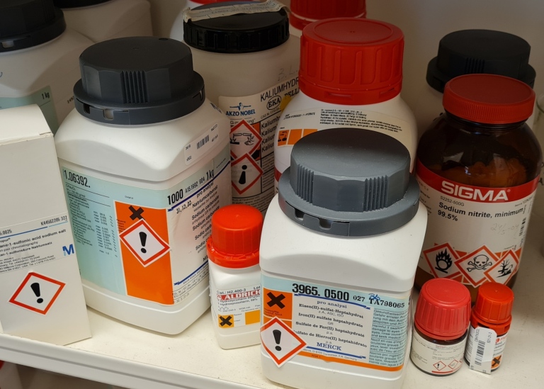 Containers of hazardous chemicals.