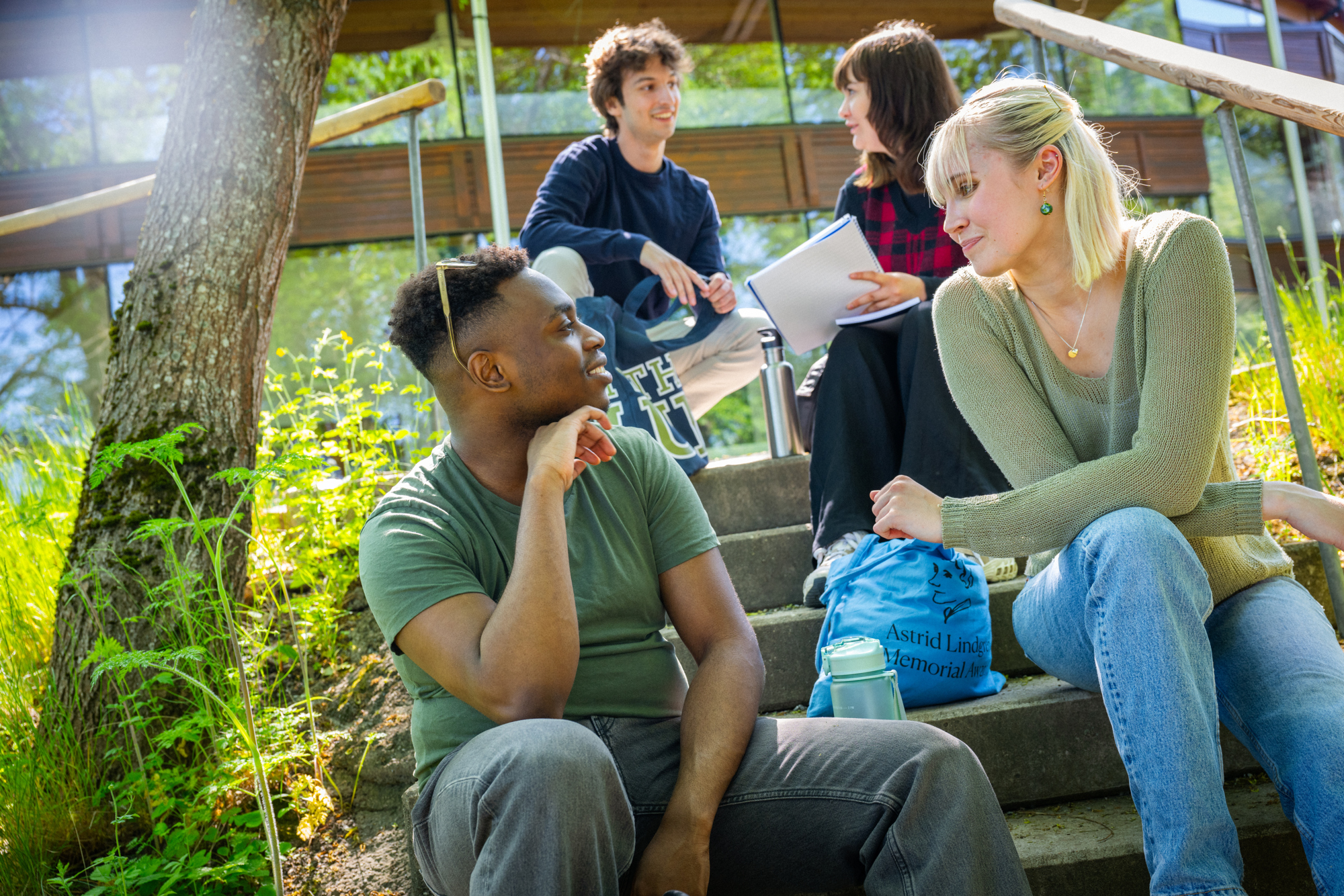 Students discussing literature on campus. Photo: Kristian Pohl/Stockholm University © May 28, 2024