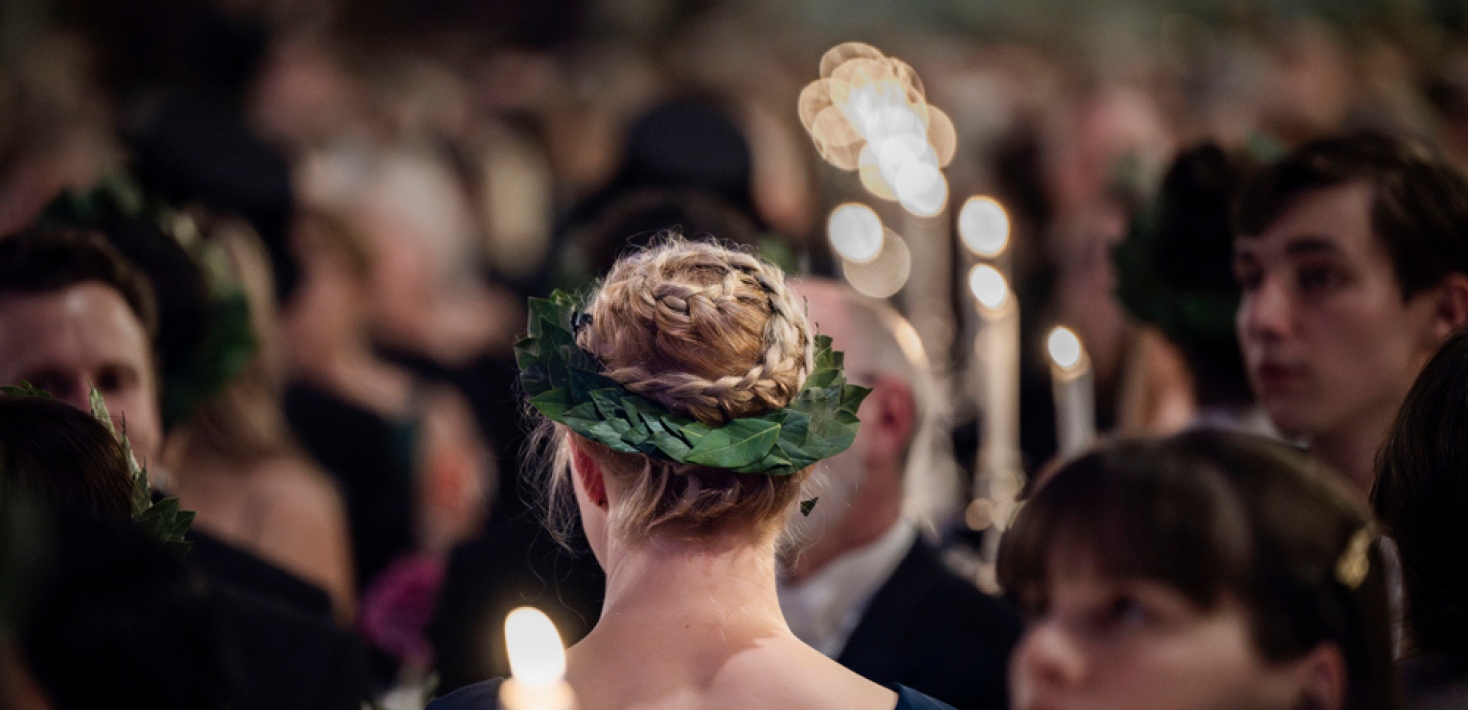 Graduated doctoral student with a laurel wreath