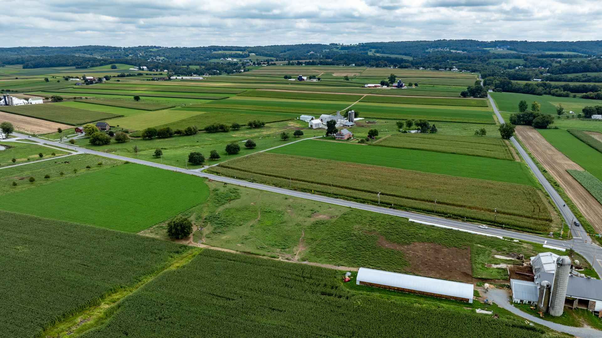 Farmland with fields, silos and rural surroundings