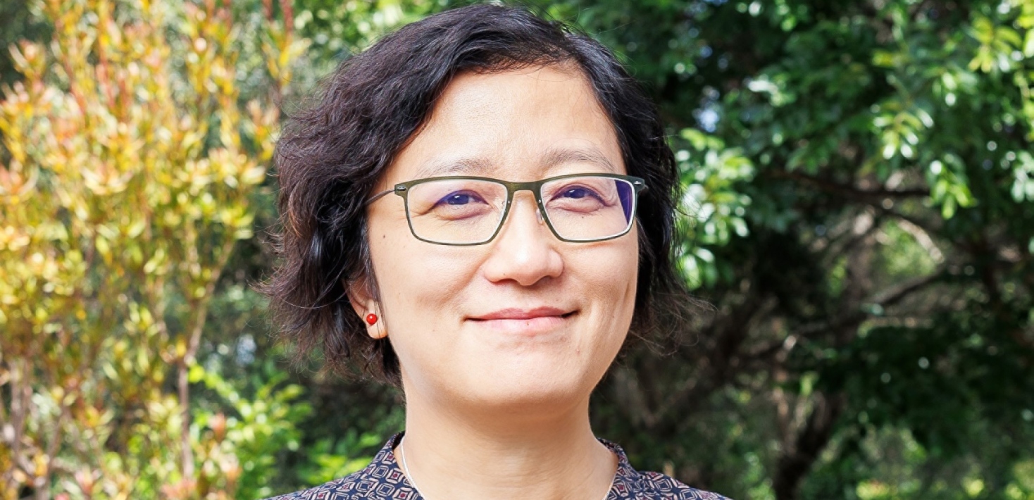 Porträtt av Qiaolin Deng