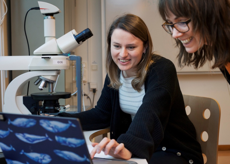 Student and teacher in Biology class