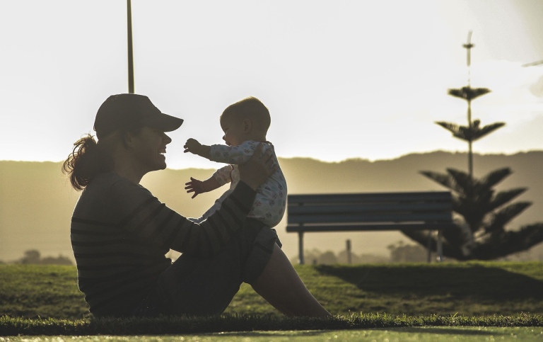 Mother and child at sunrise