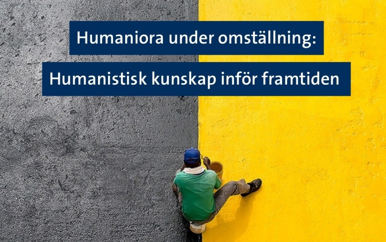 halva bilden är grå, halva är gul. Person syns uppifrån på färggränsen som målar.
