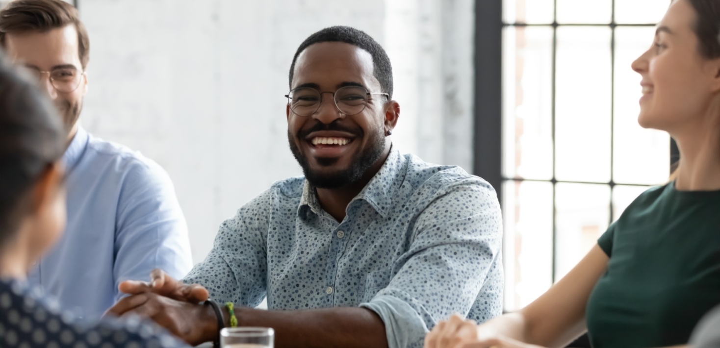 People talking at a table.