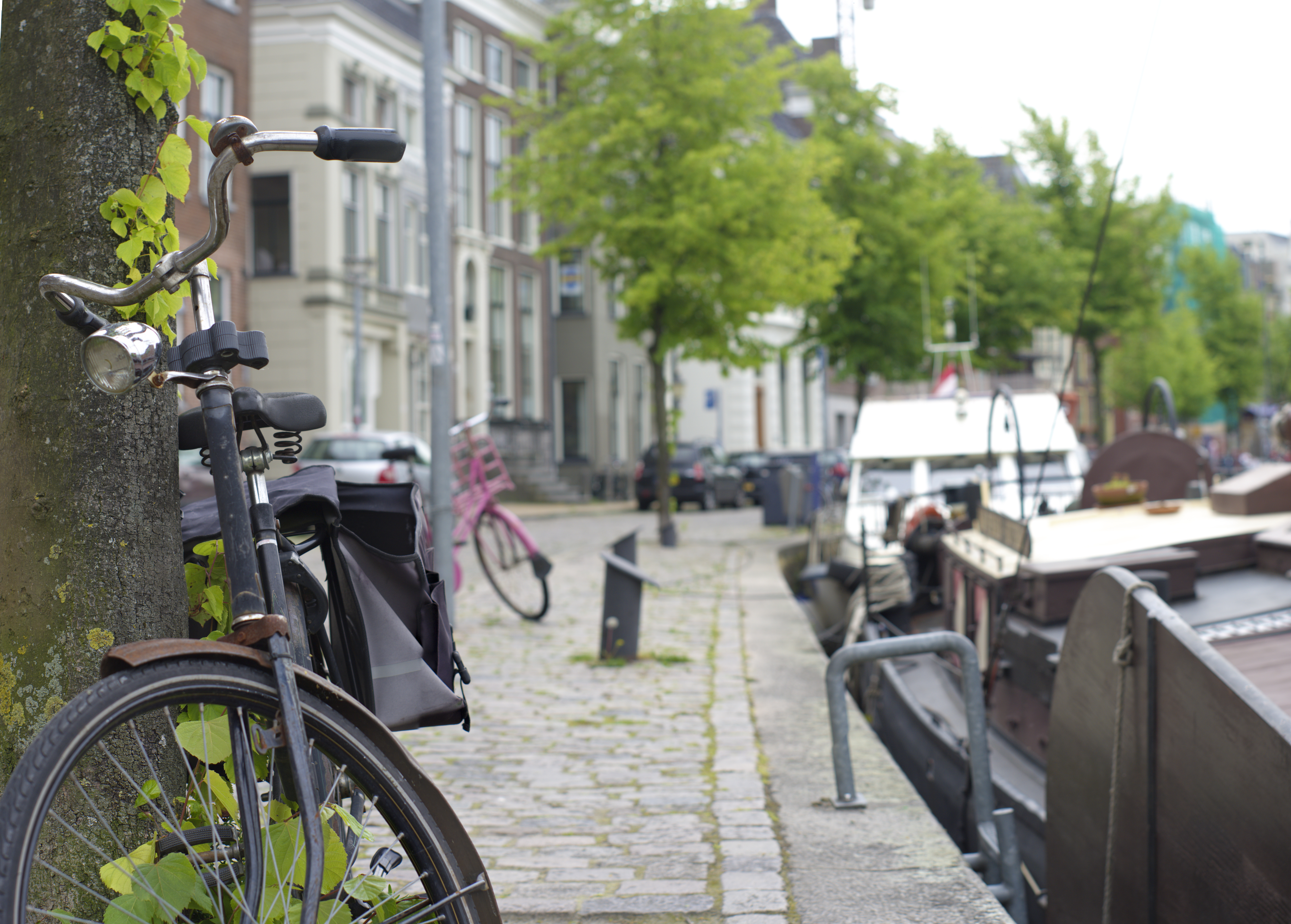 Bicycles next to a canal.