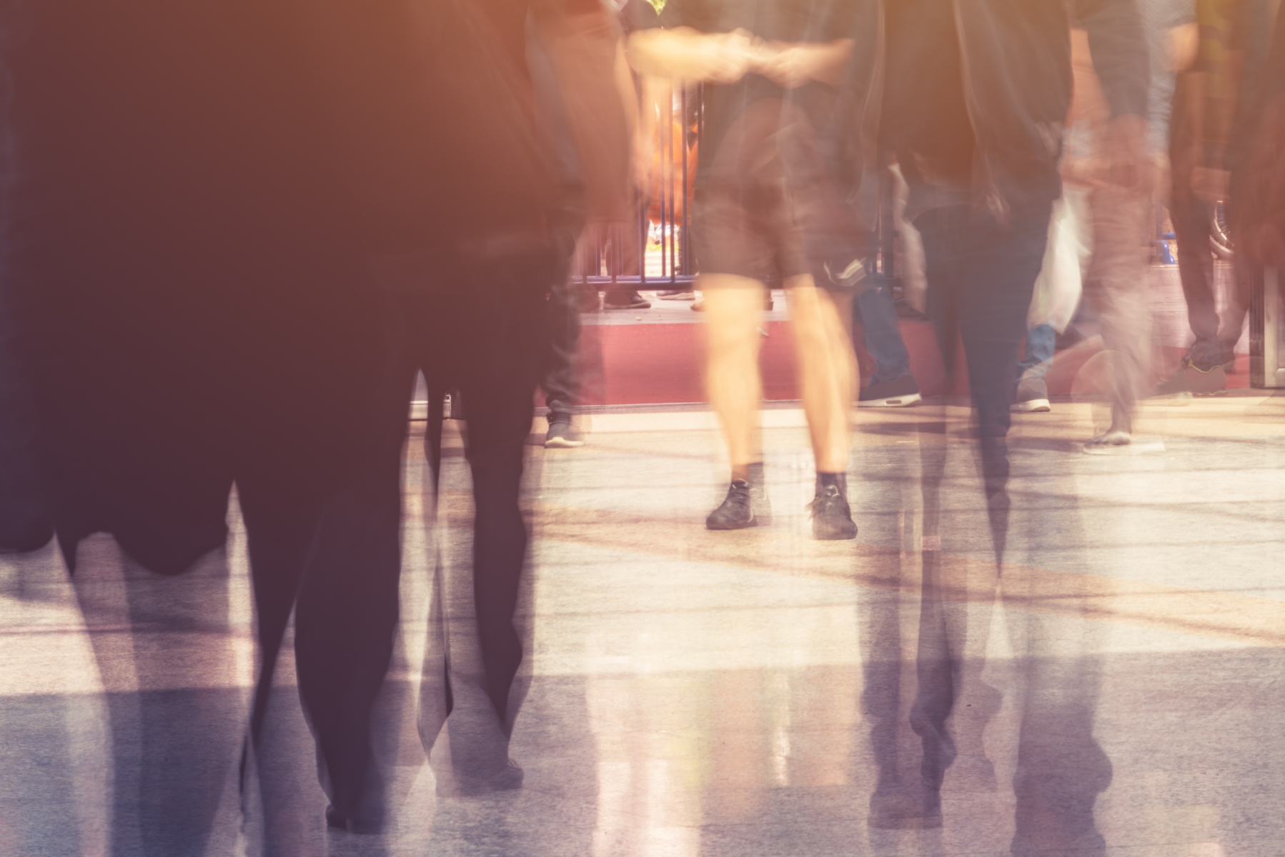 Blurred picture of a crowd in public rush hour.