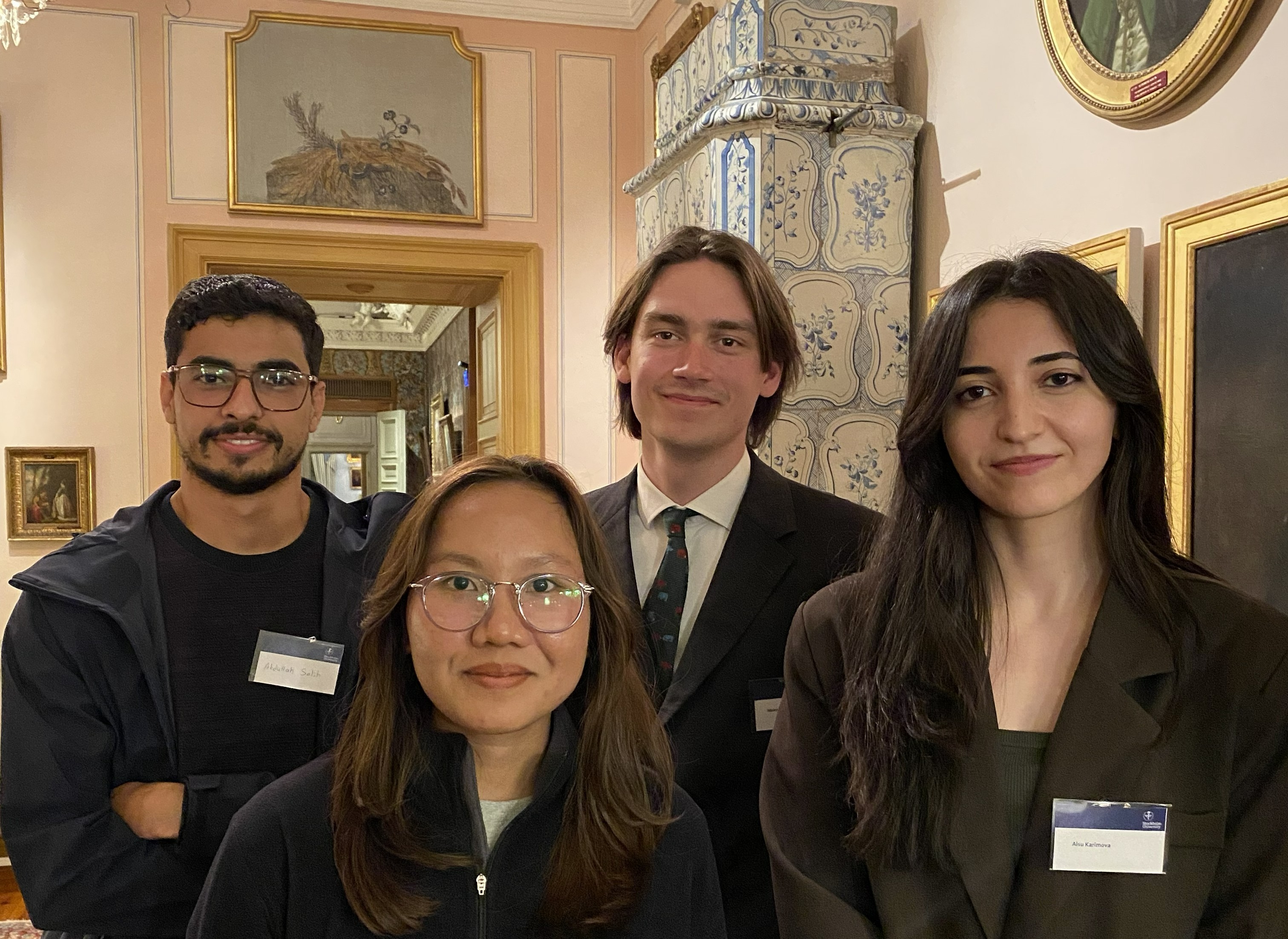 Four master's students inside Spökslottet.