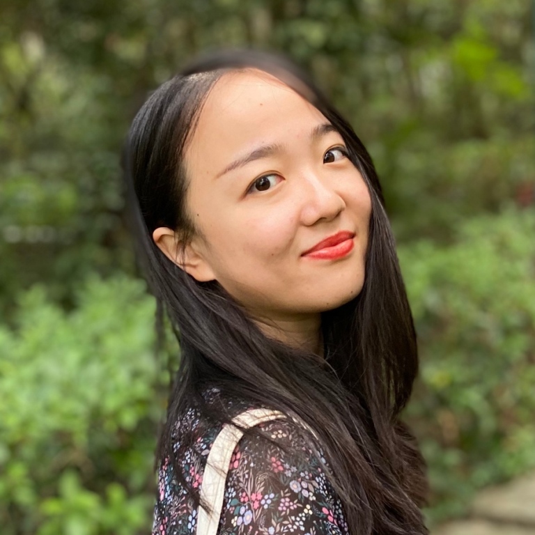 Porträttfoto av Xiaojie Xu