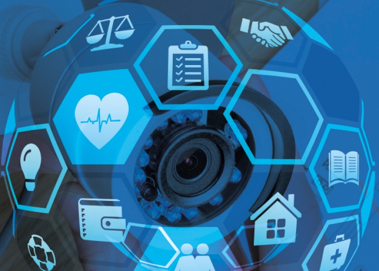 Camera lens with healthcare-related icons above. Processed image.
