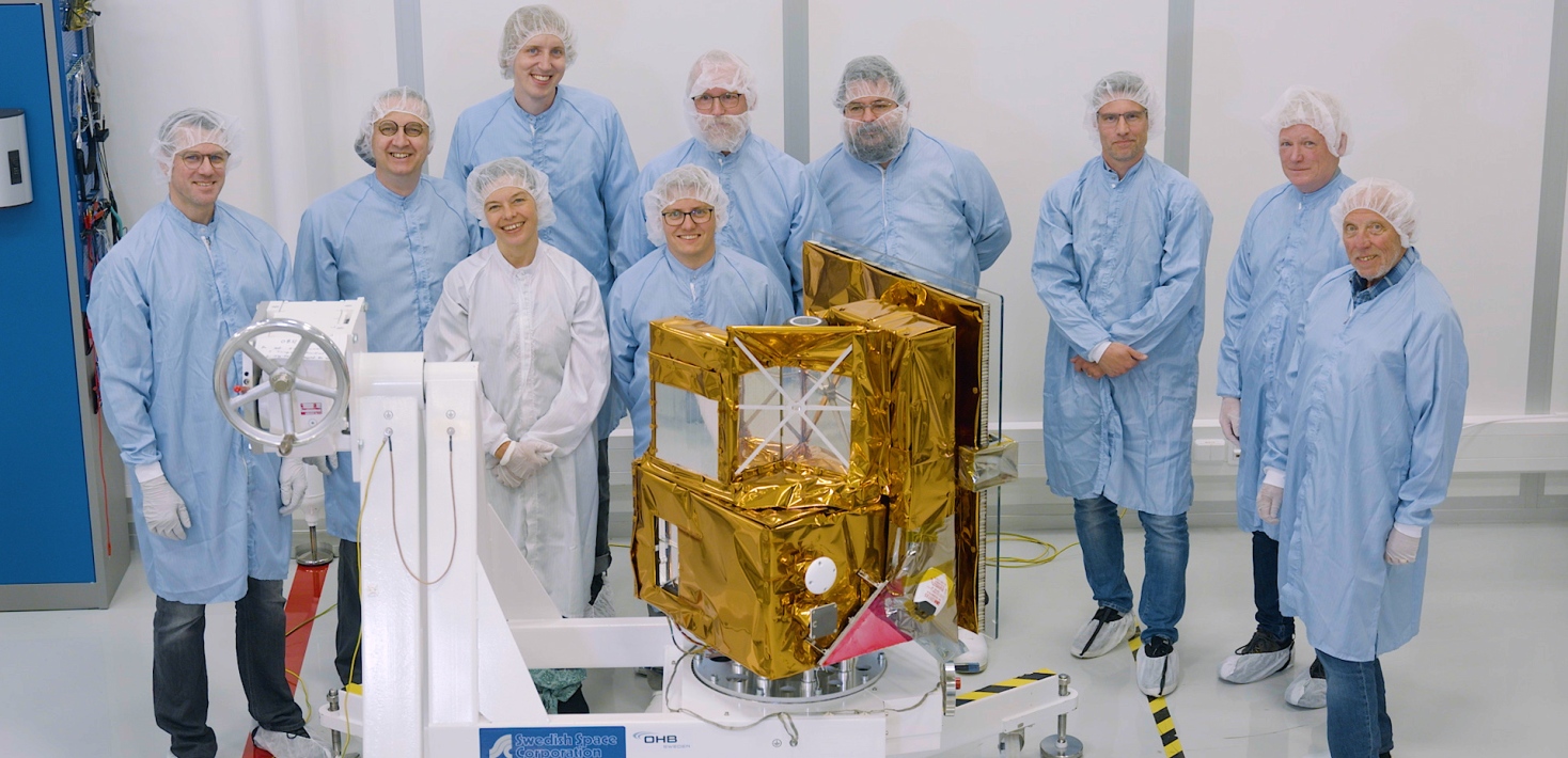 Research team at OHB Kista building a satellite.