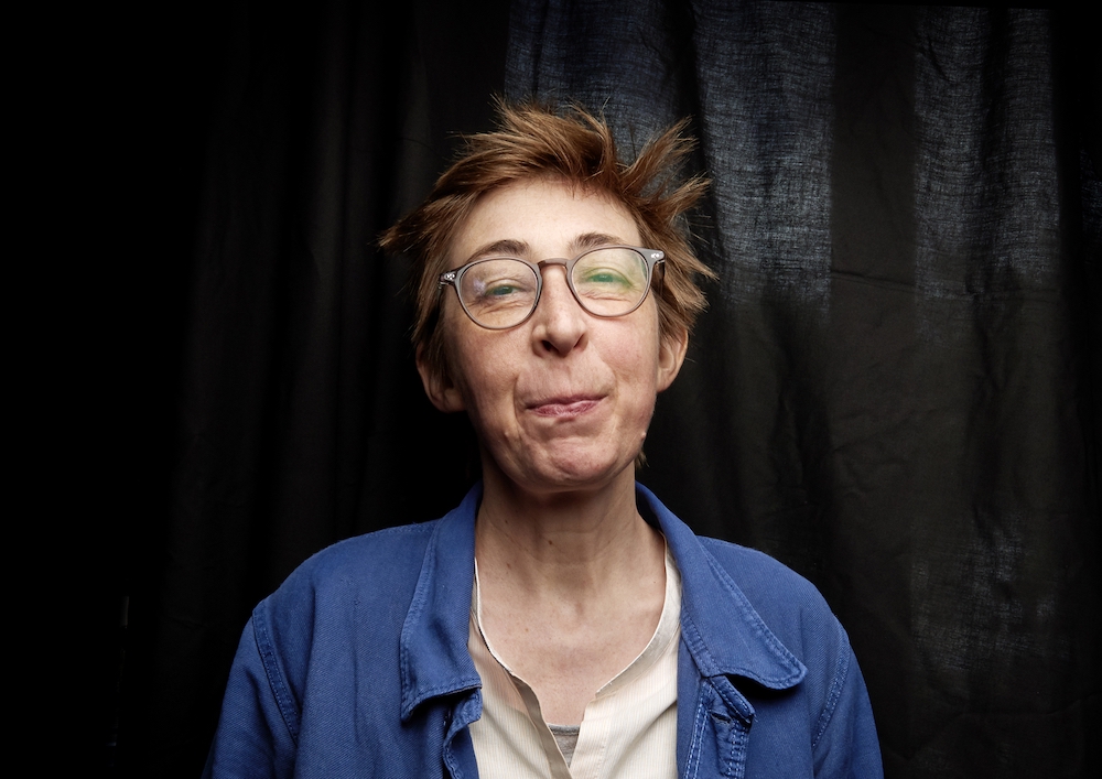 Portrait of a woman with short hair facing the camera