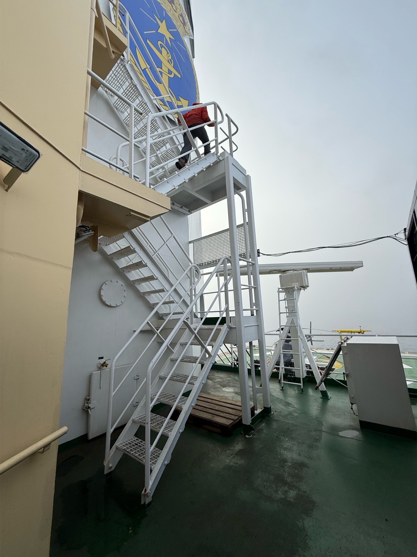 Caption: Missy Westland (University of British Columbia) heading up the stairs to the meteorology lab on the 7th deck.
