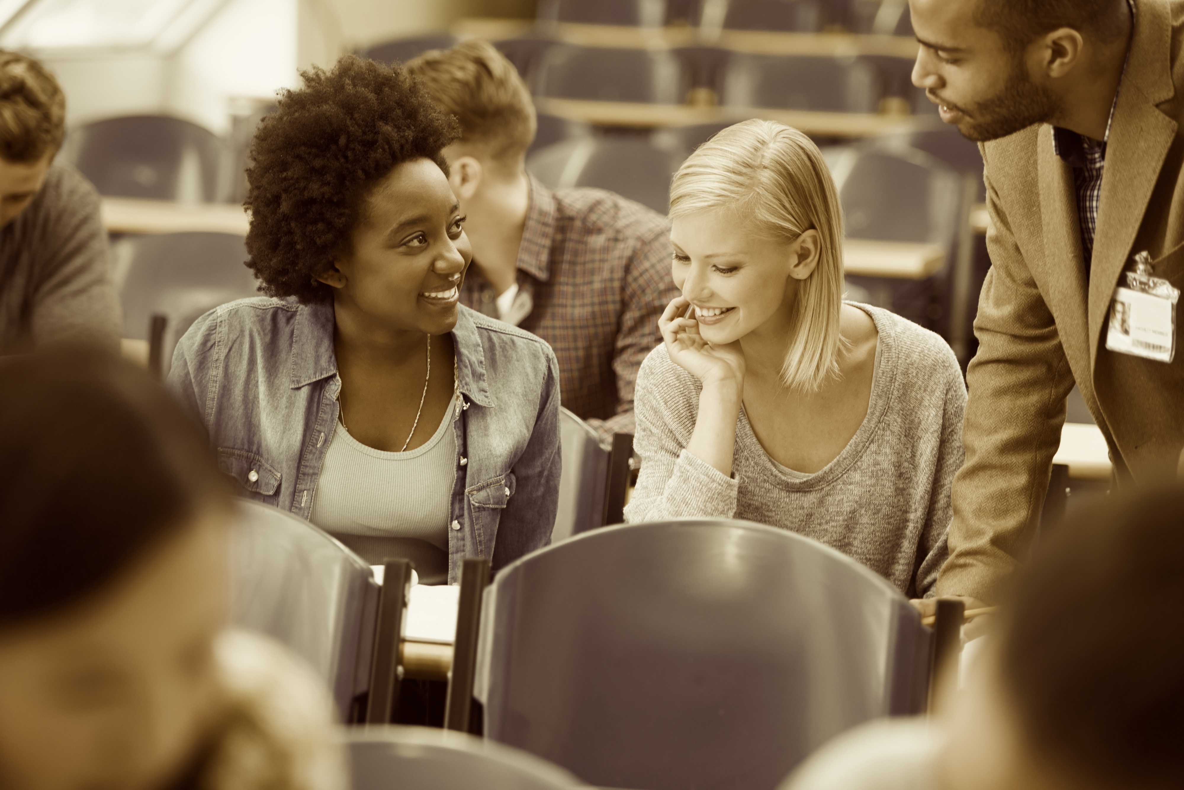 Students in a lecture hall. Photo: Yuri Arcurs/Mostphotos