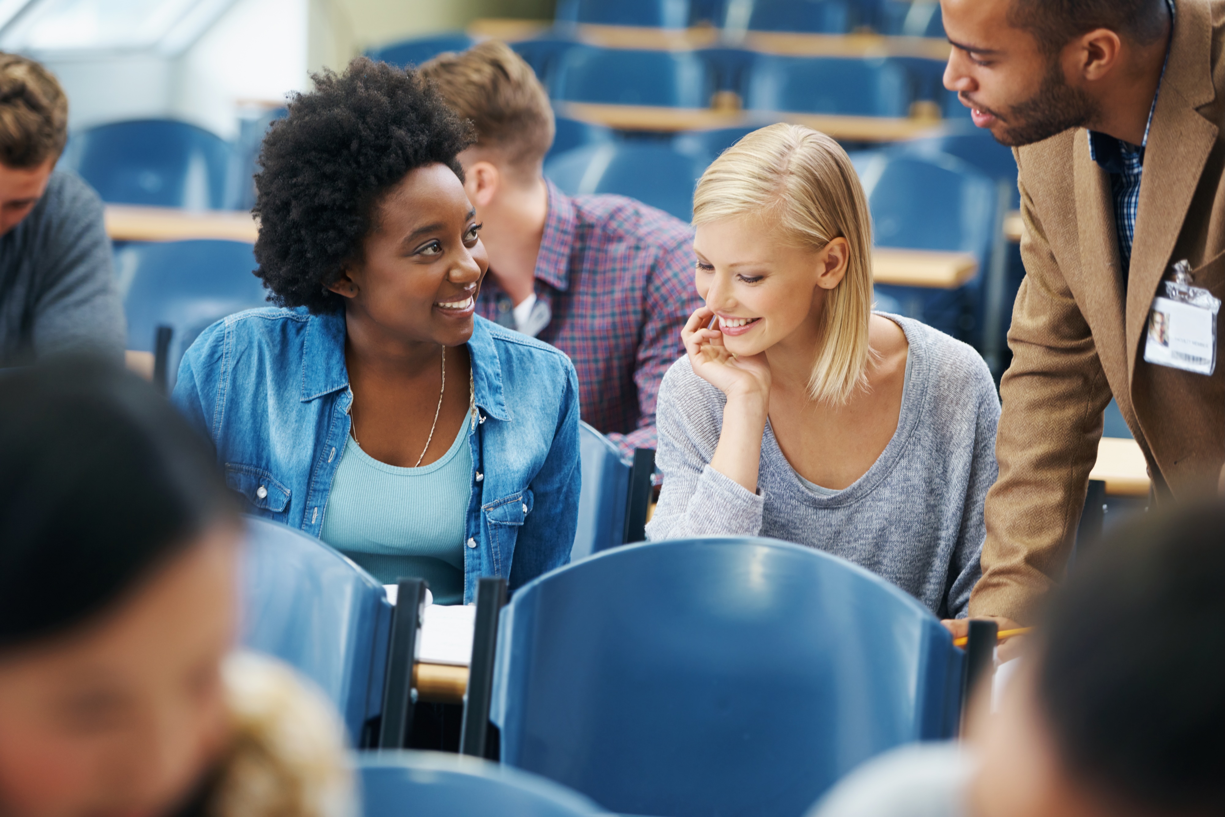 Students in a lecture hall. Photo: Yuri Arcurs/Mostphotos