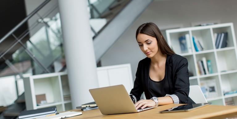 Woman working in office. Photo: Boggy/Mostphotos ID: mp16289921