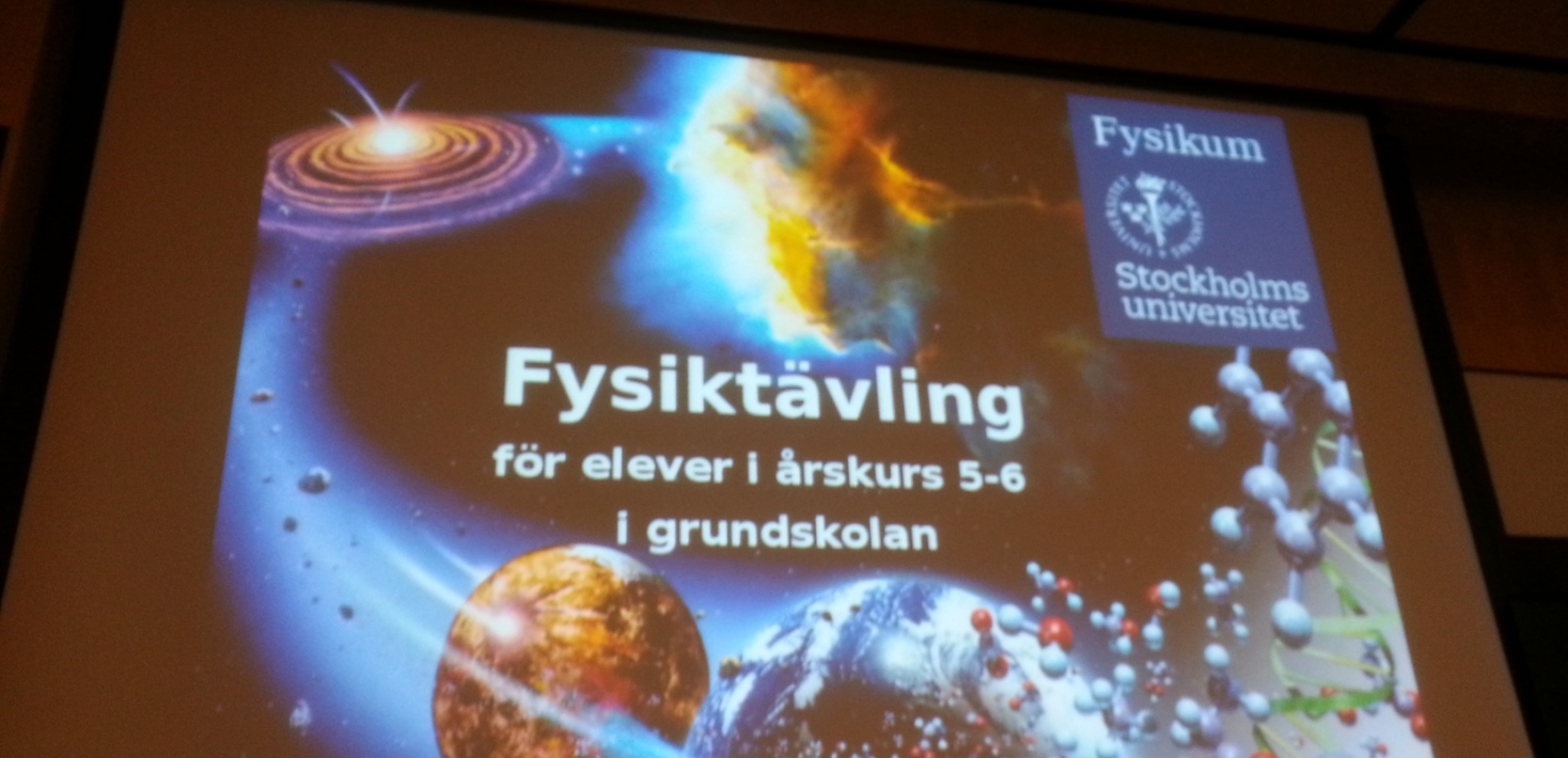 Presentation på en skärm där det står Fysiktävling