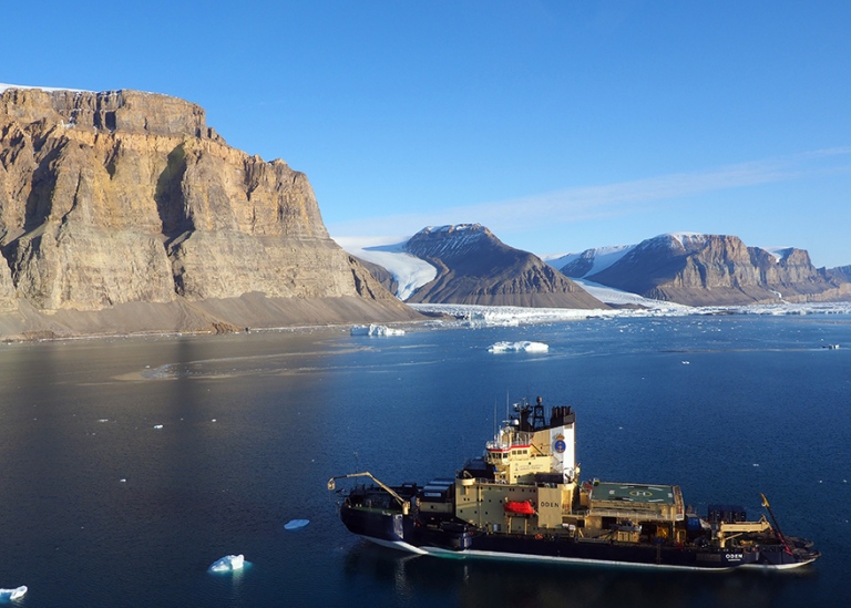 Icebreaker Oden infront of Ryder glacier.