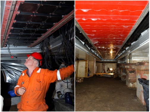 man looking up to the Transmitting array, looks like a red conveyor belt