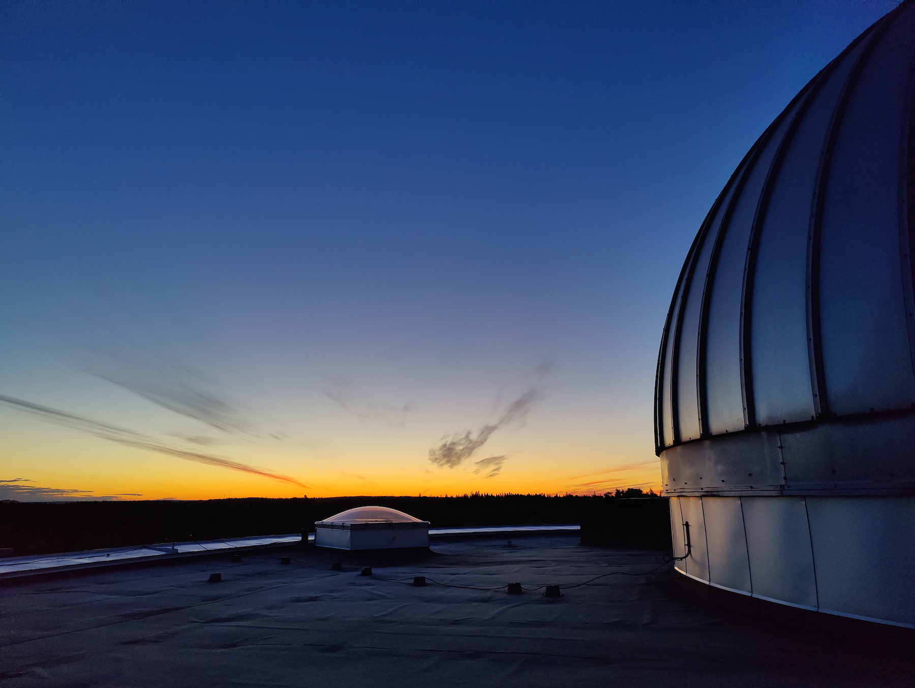 The AlbaNova Telescope in late evening.