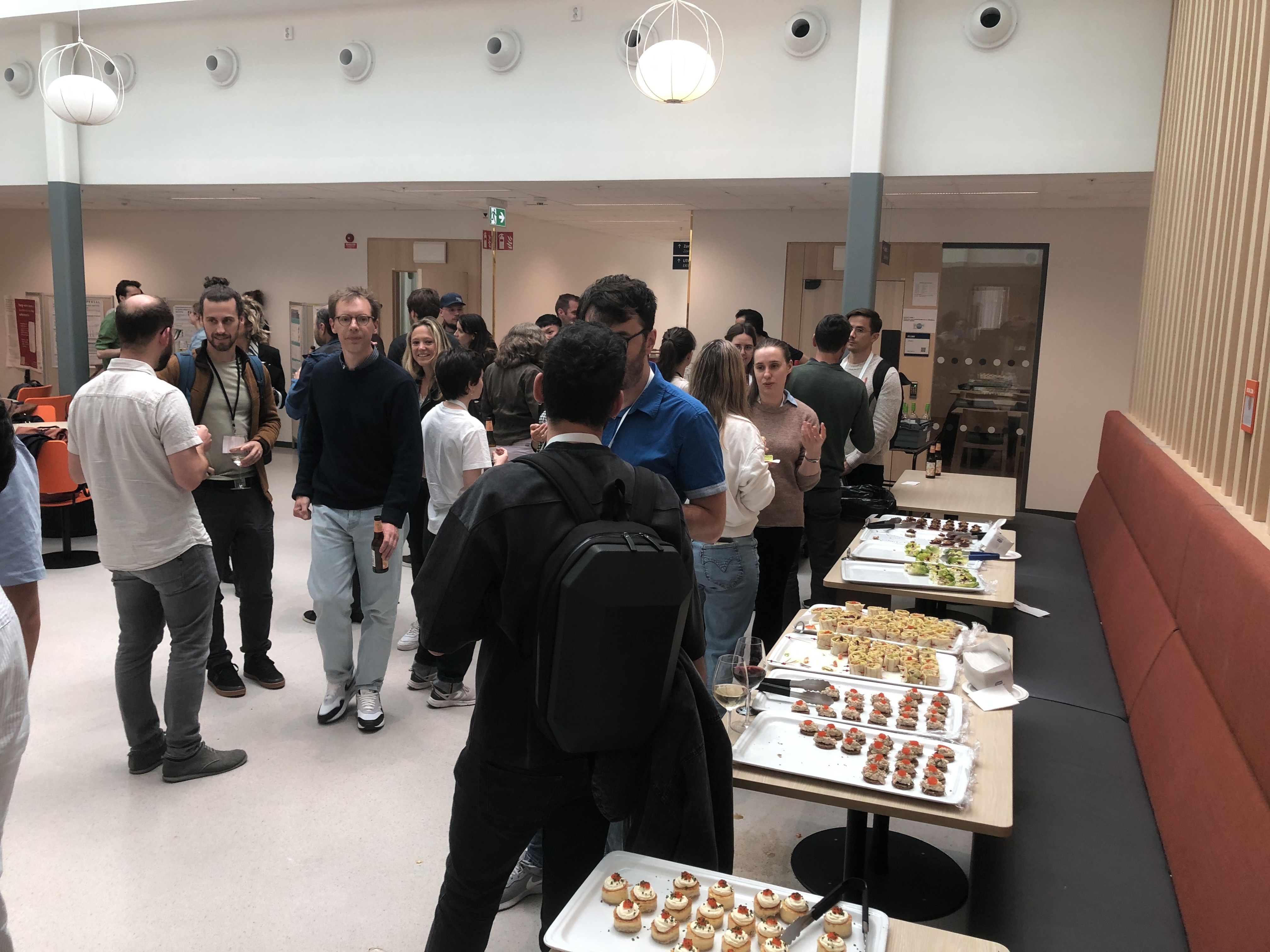 People chatting and eating snacks