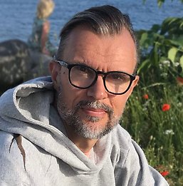 Porträttfoto på Malcolm Jacobson