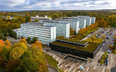 Drone picture of Södra huset's Building A–F and the Student House in Frescati.