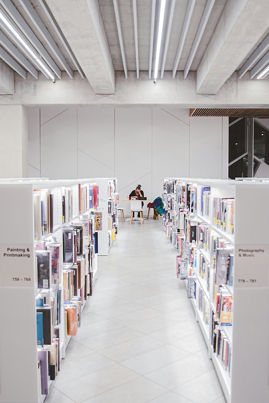 Person in library.