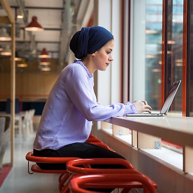 Student with a computer