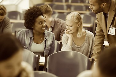 Students in a lecture hall. Photo: Yuri Arcurs/Mostphotos
