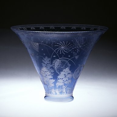 Blå glasskål med fyrverkidesign
