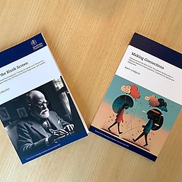 Jakob Mechler's and Karin Lindqvist's theses on a table.