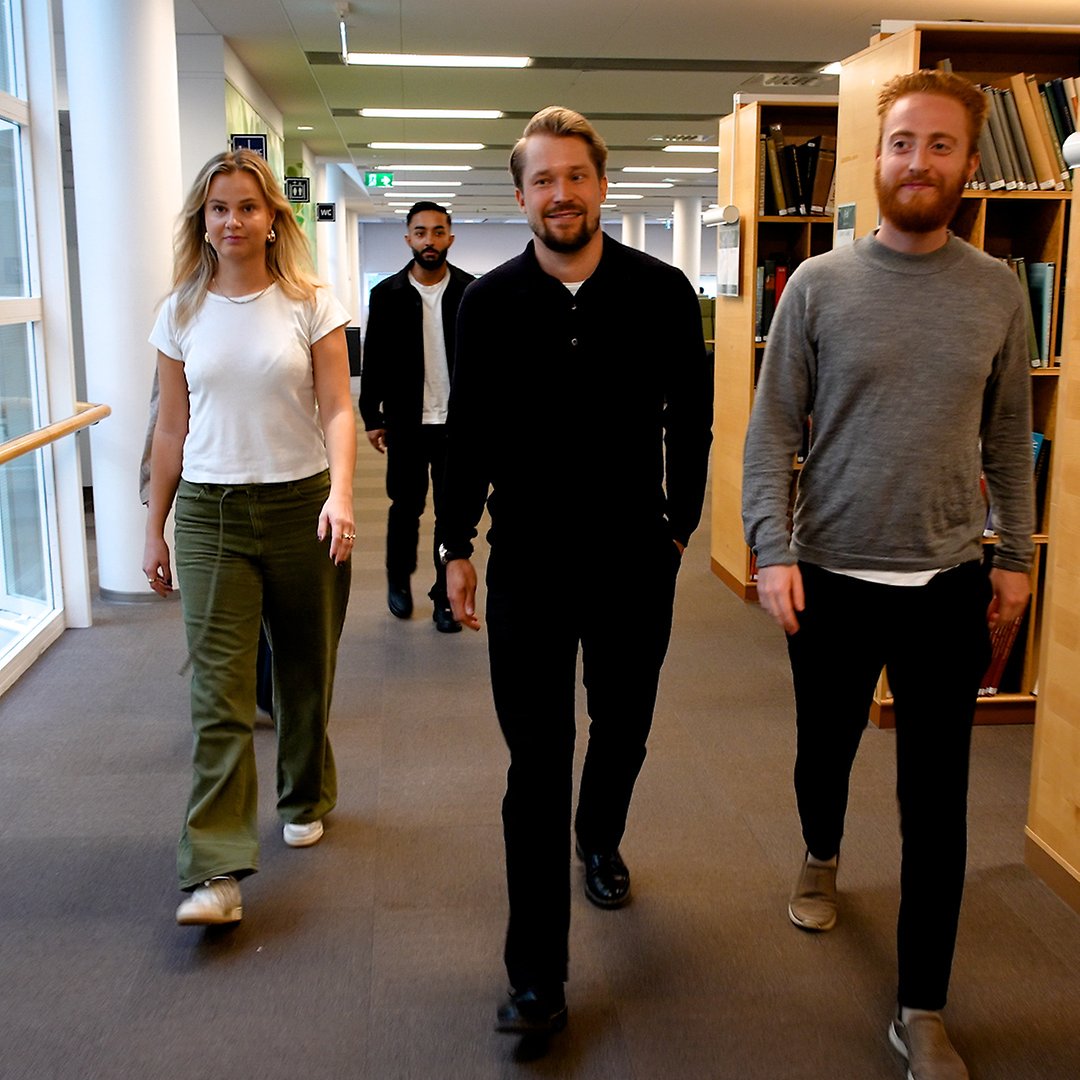 Researcher Joonas Tuhkuri in the library.
