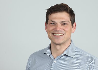 Researcher in blue shirt