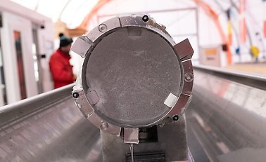 Close-up of the circular front of an ice core sample.
