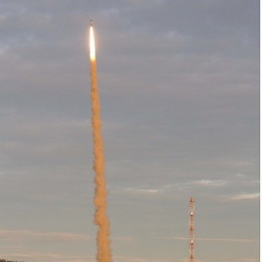 Glowing rocket and engine smoke.