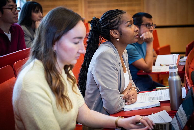 Students in a lecture hall.