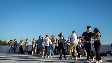Group of people dancing.
