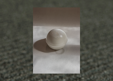 small stone ball.